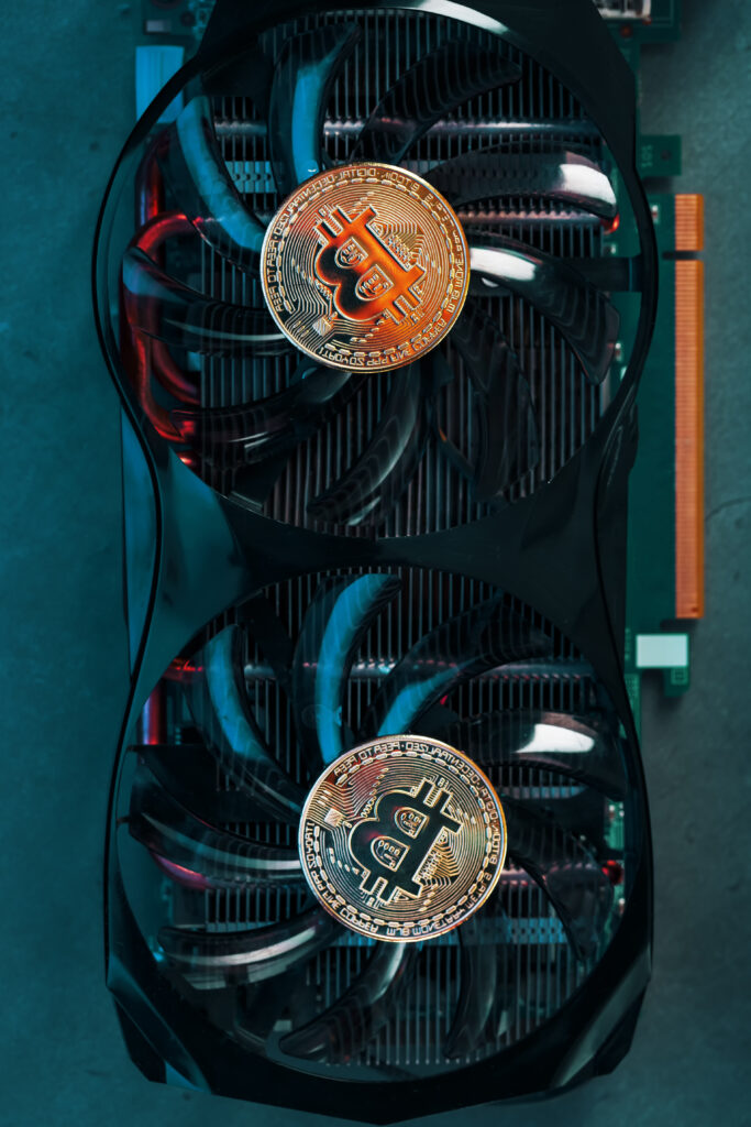 gold-bitcoin-coins-lie-cooler-powerful-video-card-with-cyanide-neon-illumination